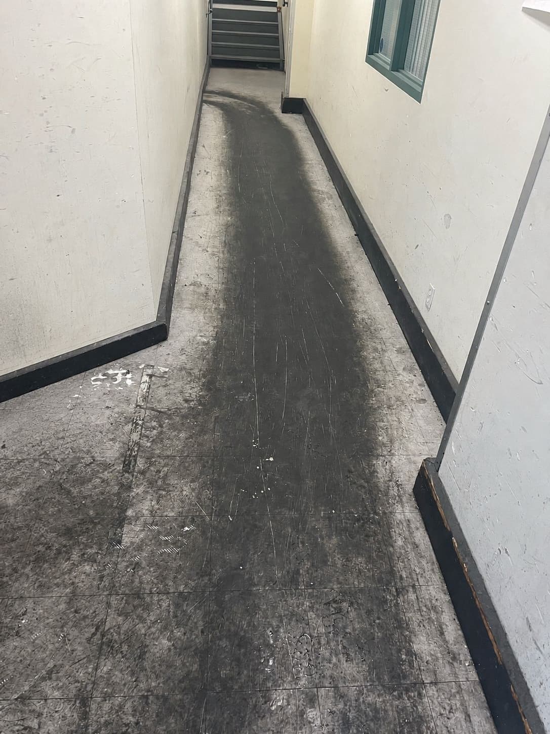 Before: Vinyl Flooring